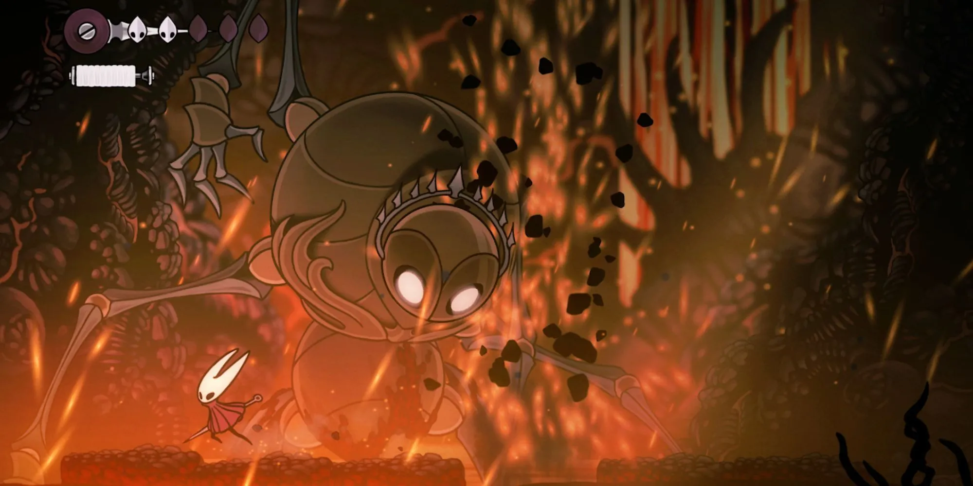 Cảnh chơi Hollow Knight Silksong với nhân vật chính Hornet nhảy qua địa hình phức tạp