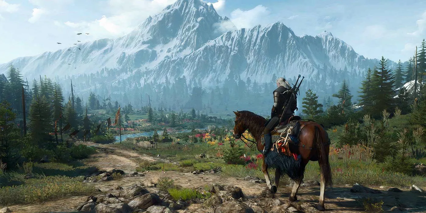 Geralt trên lưng ngựa nhìn về thung lũng với những ngọn núi hùng vĩ phía sau