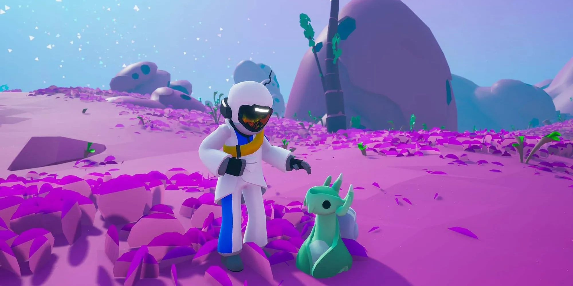 Nhân vật đang vuốt ve sinh vật ngoài hành tinh trong game sandbox phiêu lưu Astroneer