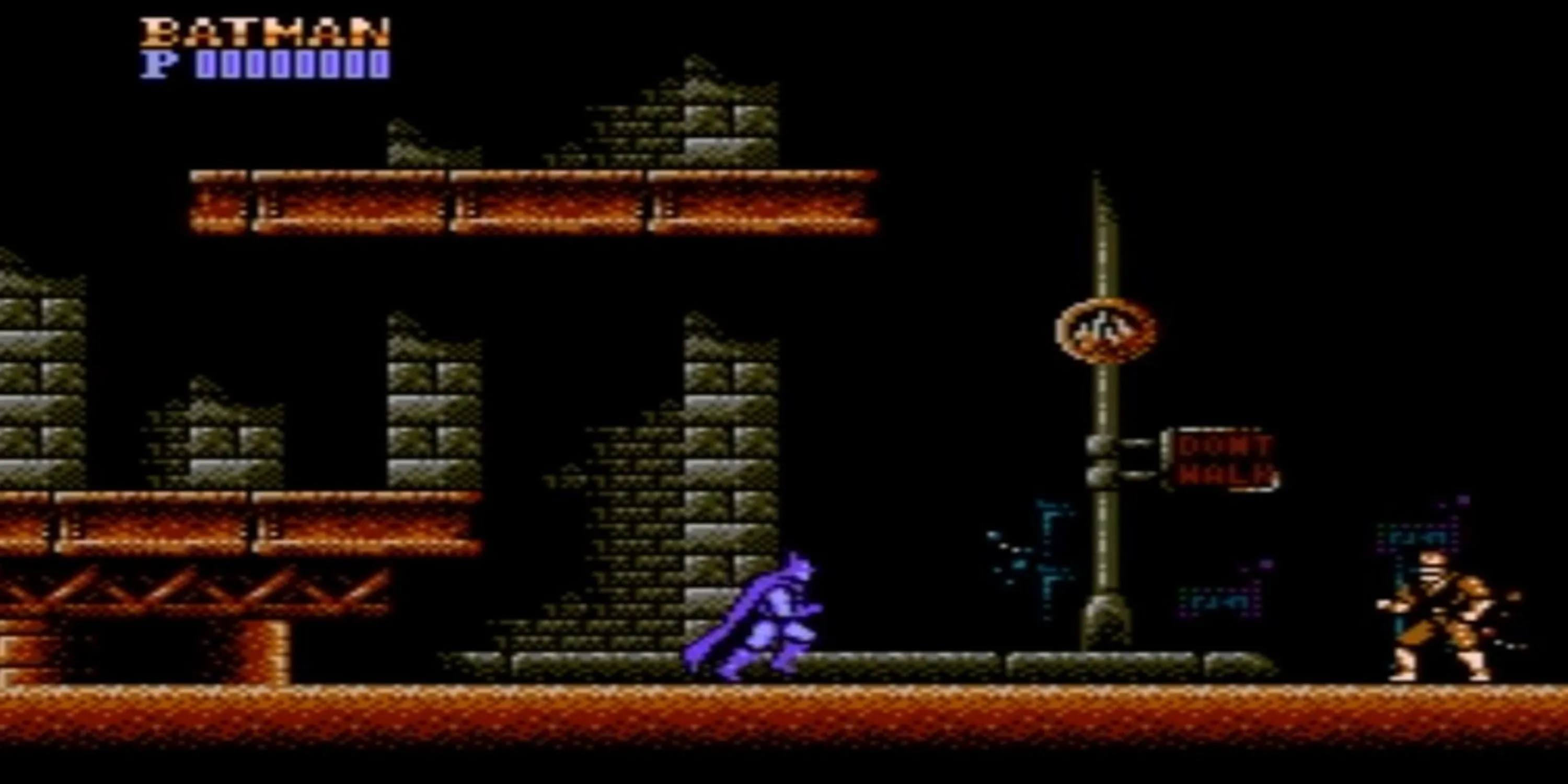 Batman đối đầu với kẻ thù trên đường phố Gotham trong Batman: The Video Game, một cảnh hành động điển hình của game NES.