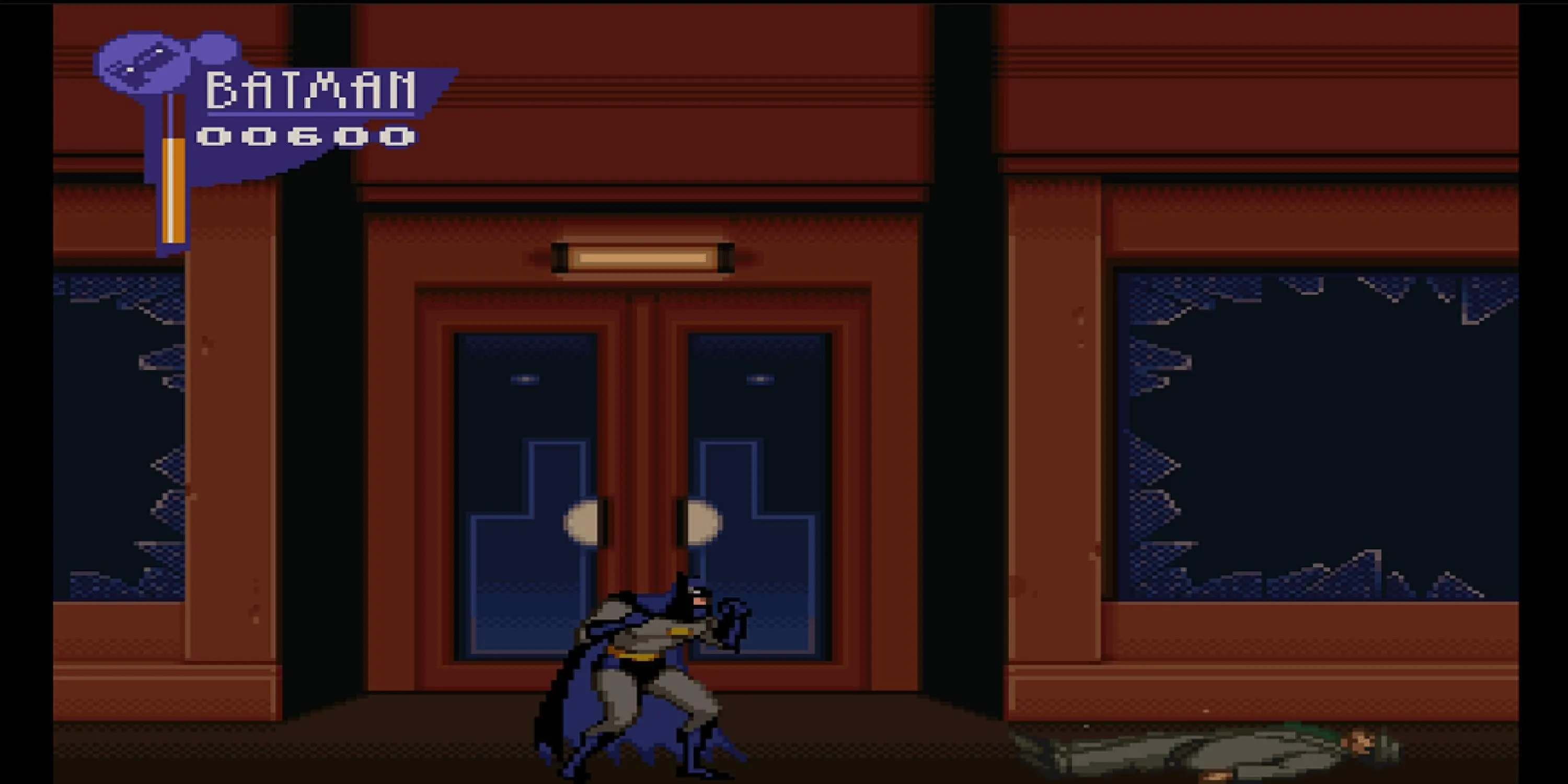 Batman sau khi chiến đấu với kẻ thù trên đường phố trong The Adventures of Batman and Robin, với thiết kế dựa trên phim hoạt hình.