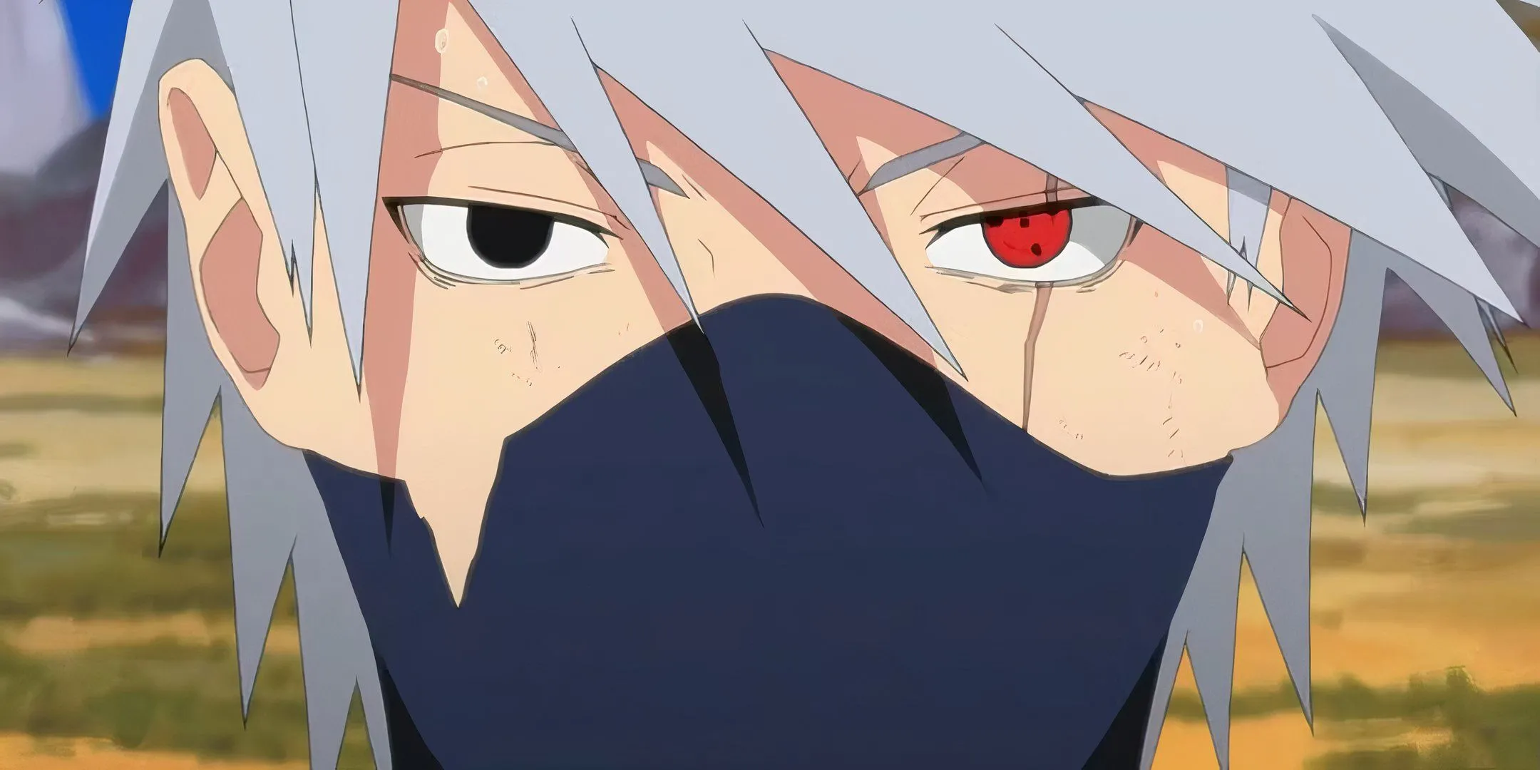 Cận cảnh khuôn mặt Kakashi Hatake với Sharingan, thể hiện sự điềm tĩnh và quyền năng của vị thầy giáo nổi tiếng trong Naruto.