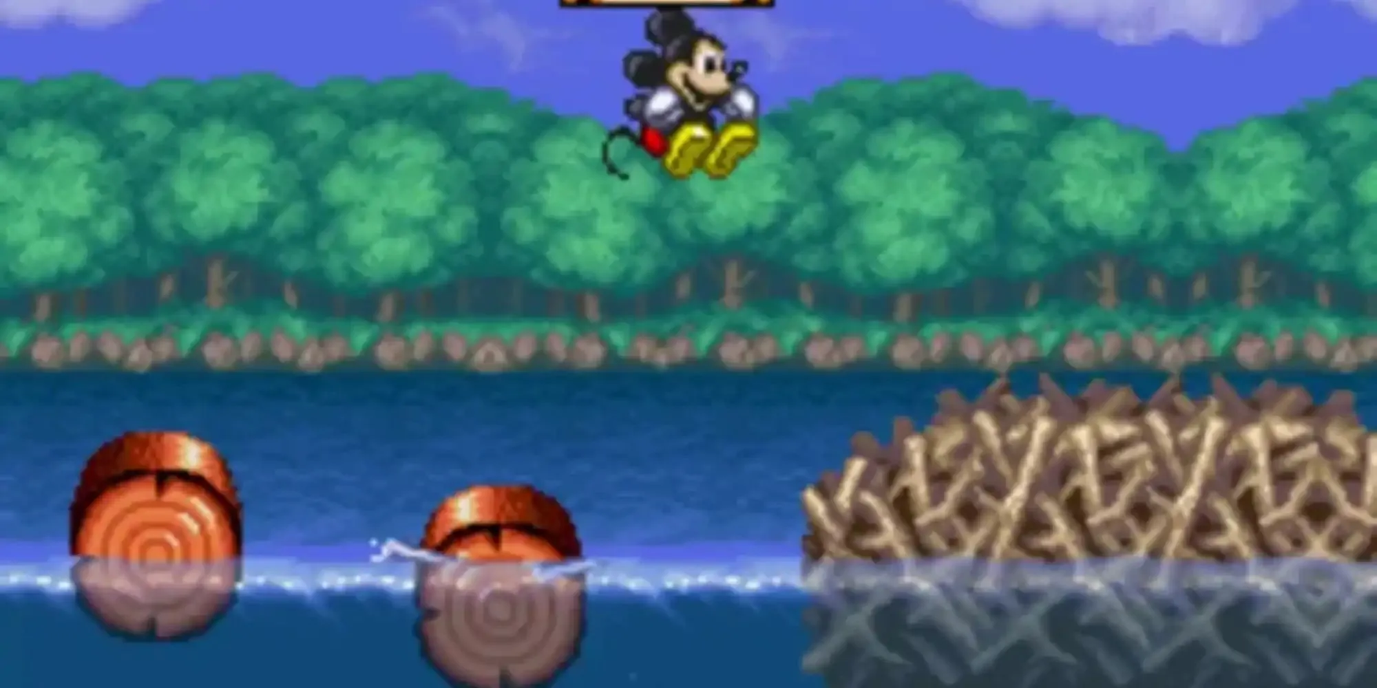 Chuột Mickey trong trang phục pháp sư trong game Magical Quest Starring Mickey Mouse
