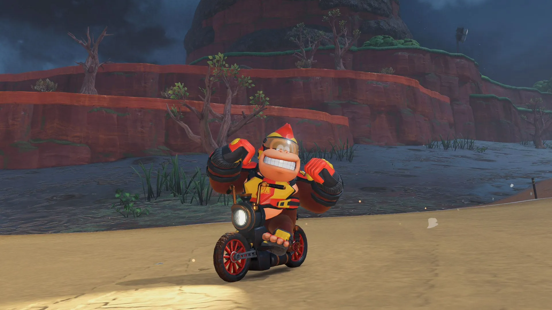 Donkey Kong tạo dáng bên chiếc xe đạp đua Flex Bike trong Mario Kart World