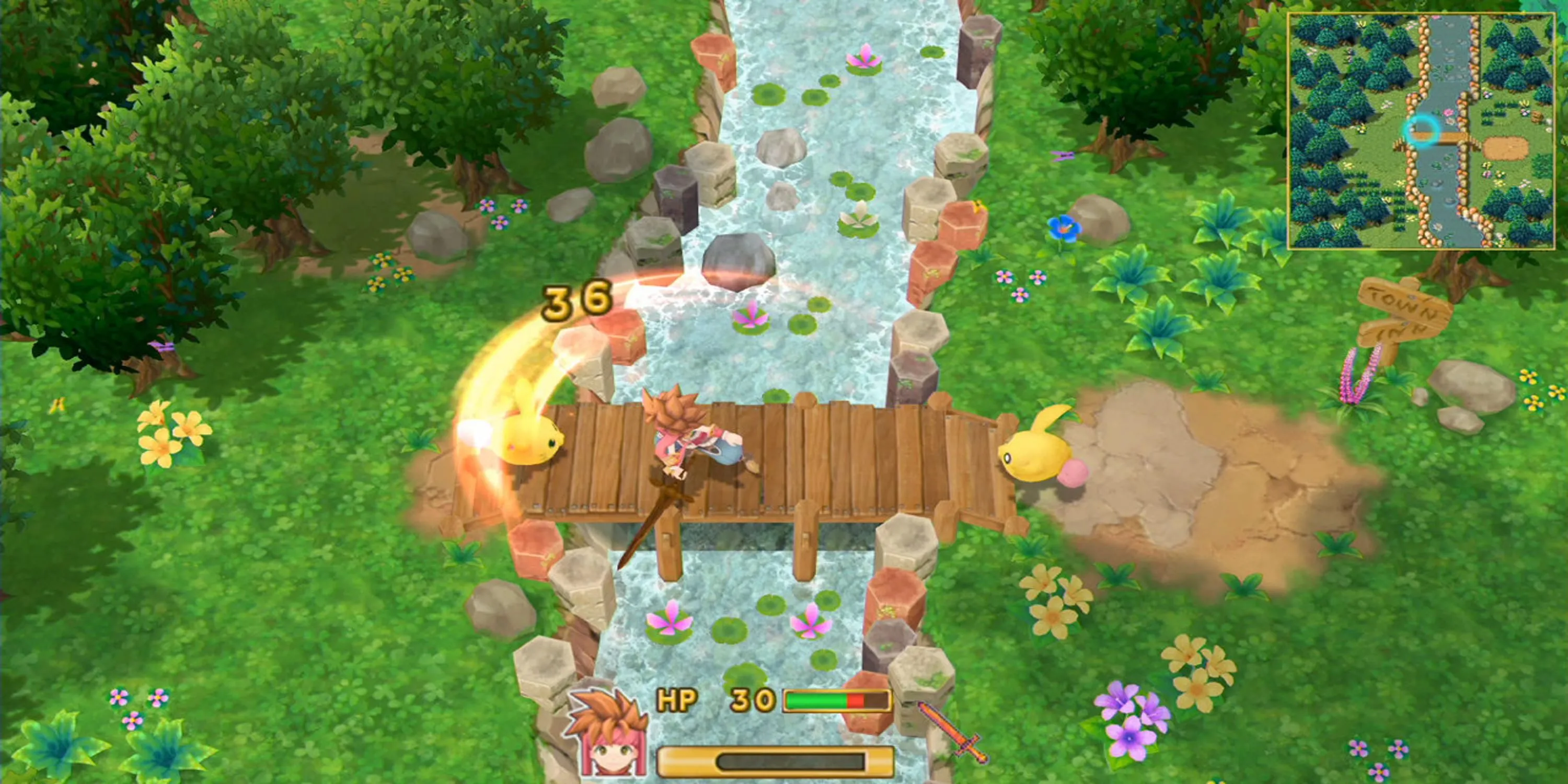 Secret of Mana (2018) - Cảnh nhân vật vung kiếm chiến đấu với quái vật trong thế giới đầy màu sắc.