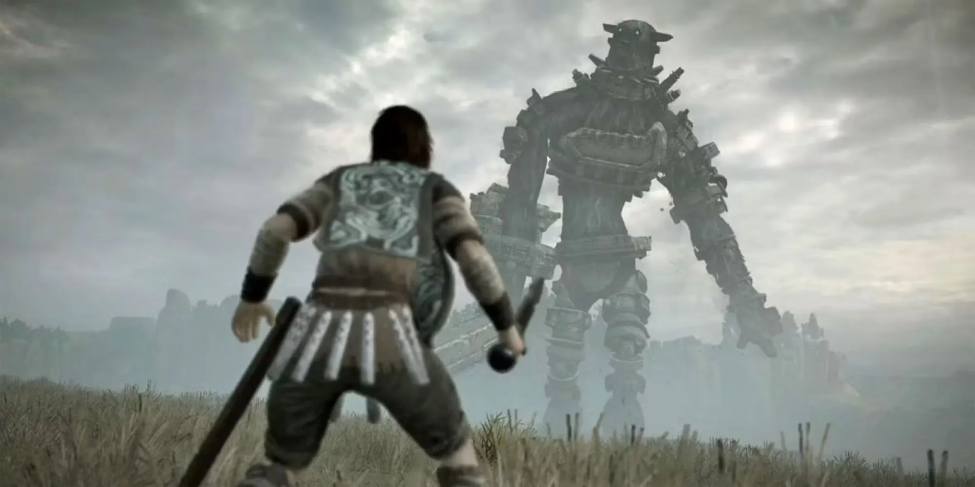 Wander đứng đối diện một Colossus khổng lồ, biểu tượng của Shadow of the Colossus