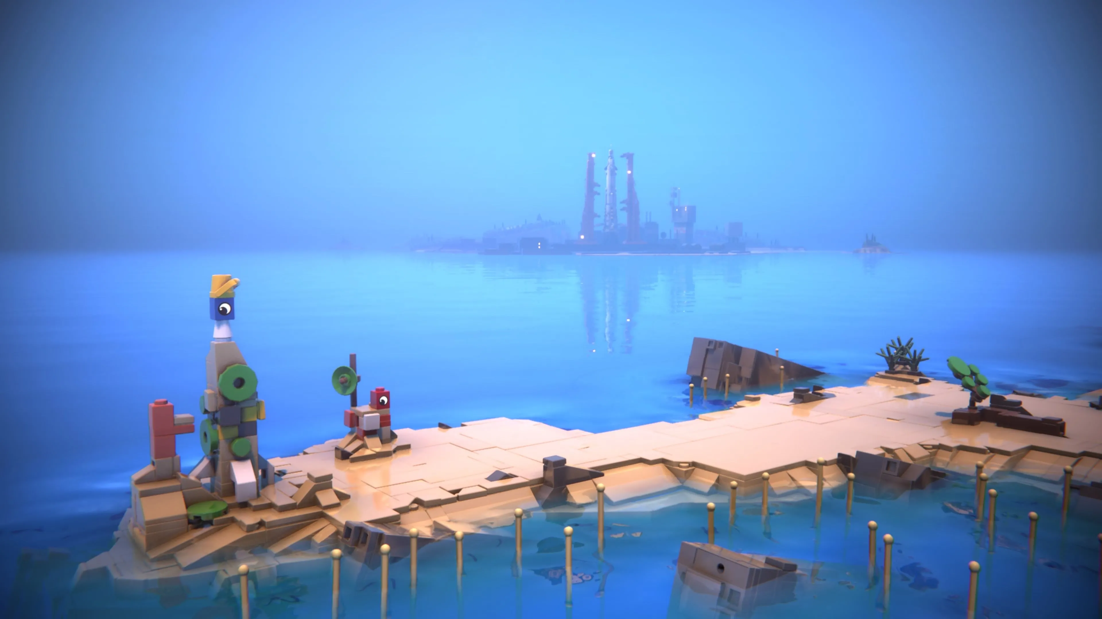 Hai nhân vật Red và Blue trên bãi biển của hòn đảo quê hương trong LEGO Voyagers
