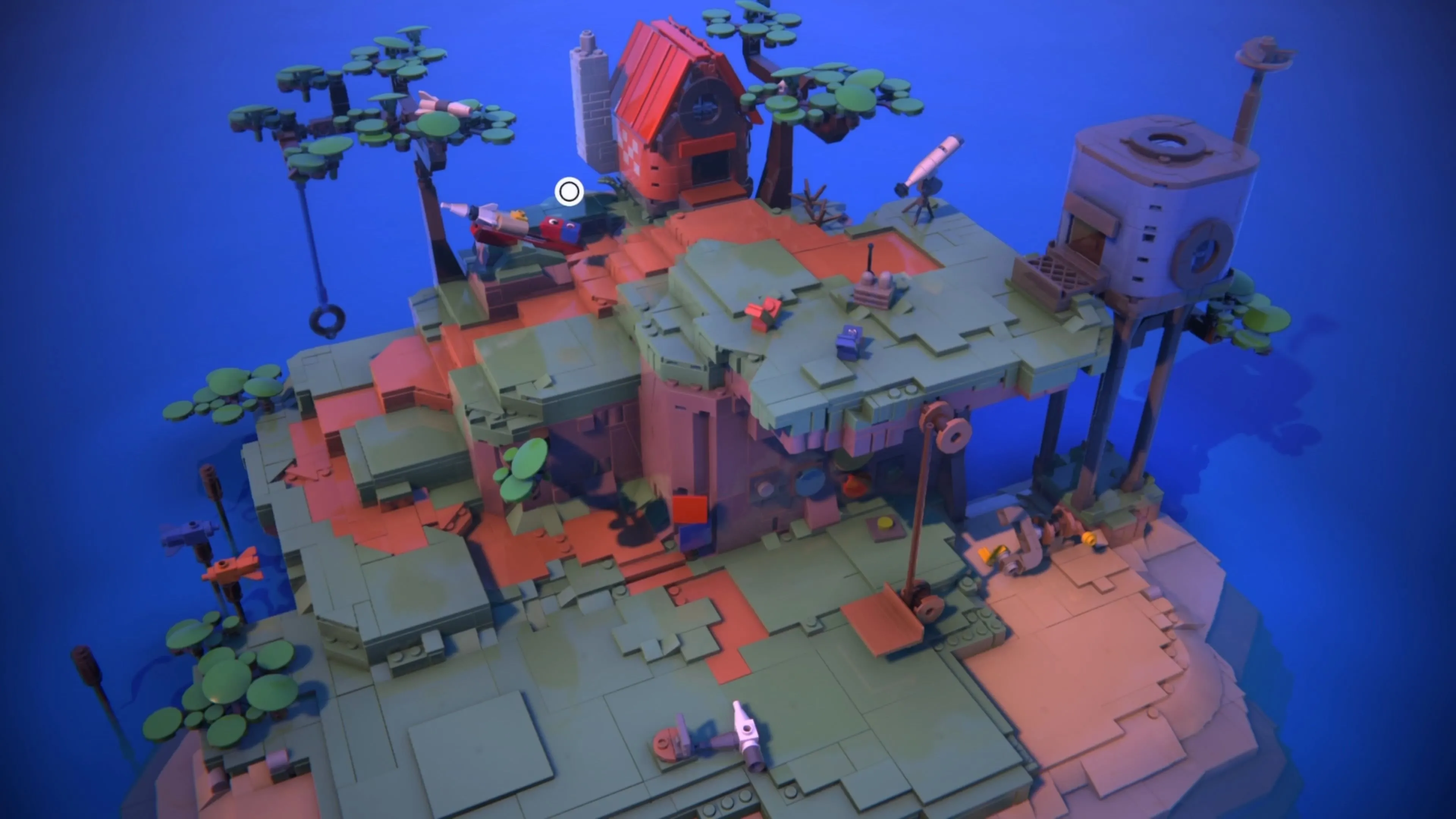 LEGO Voyagers: Cảnh quay từ trên cao Đảo Nhà với các nhân vật Red và Blue đang tương tác với một chiếc xích đu lốp xe, cùng các đồ chơi khác nằm rải rác