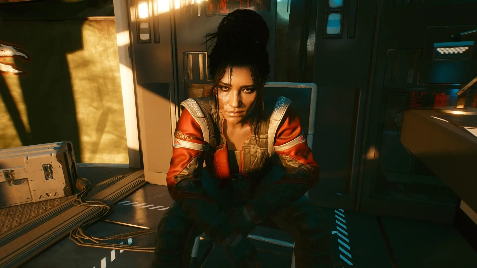 Panam Palmer với chiếc xe Nomad biểu tượng và ánh mắt đầy quyết tâm trong thế giới Cyberpunk 2077
