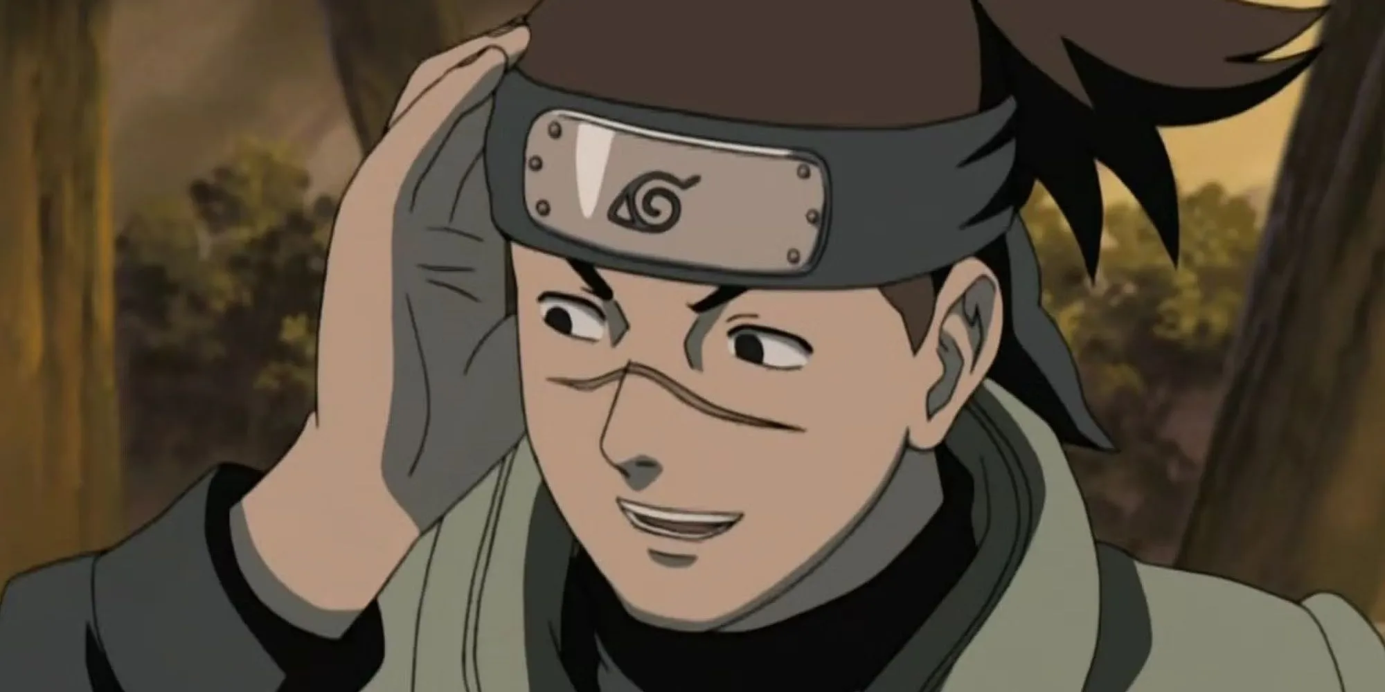 Thầy Iruka Umino, người thầy ninja đầy lòng trắc ẩn và là người đầu tiên công nhận Naruto Uzumaki, che chở cậu bé khỏi nguy hiểm.